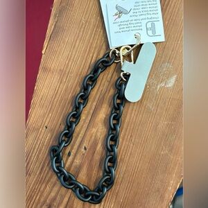 Cell phone holder/bracelet.